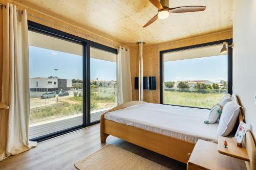 En eller flere senge i et værelse på Victoria Atlantica