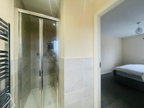 En eller flere senge i et værelse på Greenside View