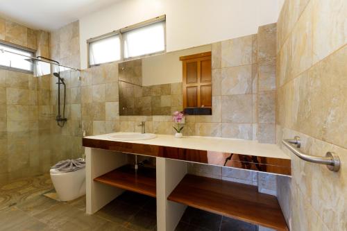 a bathroom with a sink and a mirror at New Boutique Pool Villa Sequoia Close to Rawai and Naiharn Beach in Rawai Beach