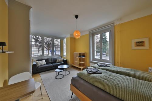 Postel nebo postele na pokoji v ubytování Union Lodge Berna