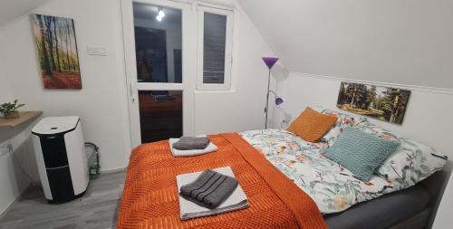 Postel nebo postele na pokoji v ubytování KissFamilyWineHouse