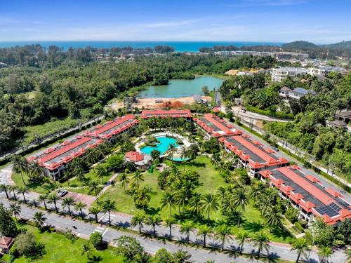 an aerial view of a resort with a lake at Laguna Luxury 2-Bed Pool Villa - Near Layan Beach in Layan Beach