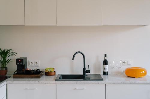 Foto A Place Antwerp - Boutique Suites & Flats - Vrijdagmarkt 18 3