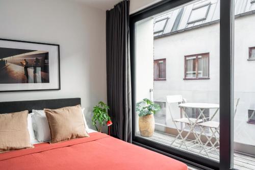 Foto A Place Antwerp - Boutique Suites & Flats - Vrijdagmarkt 18 1