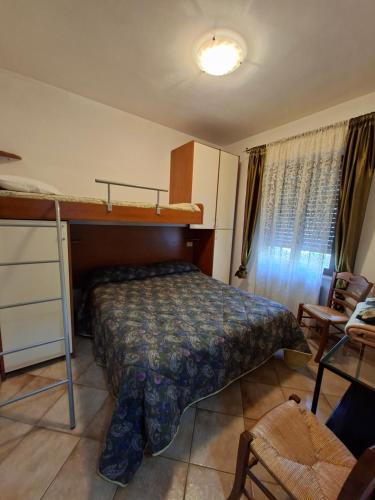 Ένα ή περισσότερα κρεβάτια σε δωμάτιο στο Gabriella