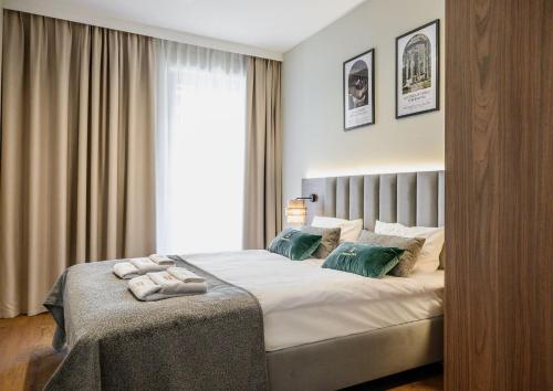 Postel nebo postele na pokoji v ubytování Polanica Park