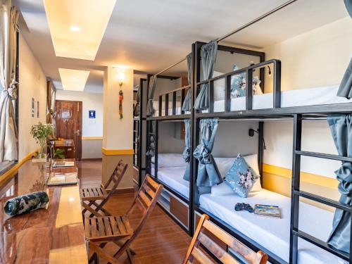 a room with bunk beds in a hostel at Moustache Hostel Gangtok in Gangtok