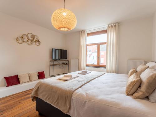 En eller flere senge i et værelse på Villa Notre Refuge - Your Belle Époque Escape by Interhome