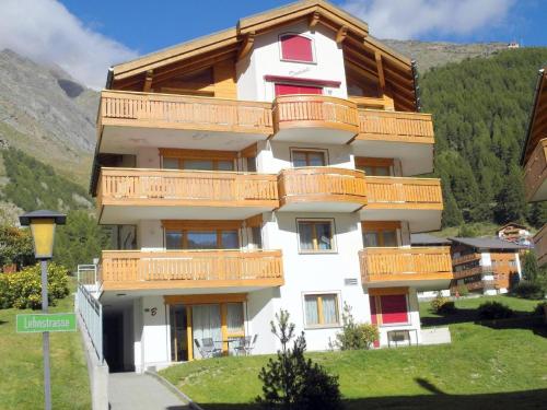 a building with balconies on the side of it at Apartment Dominic B2 by Interhome in Saas-Fee