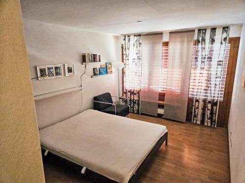 Postel nebo postele na pokoji v ubytování Apartment Encarden Apt- 3-1 by Interhome