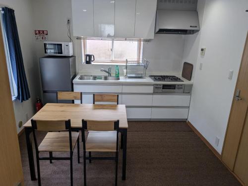 Kuchyň nebo kuchyňský kout v ubytování Nice Access Hotel