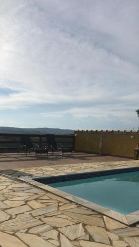 Hồ bơi trong/gần Suíte Encanto da Roça