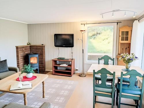 Μια τηλεόραση ή/και κέντρο ψυχαγωγίας στο Holiday Home Odden by Interhome