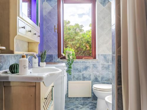 Et badeværelse på Holiday Home Lo Scrigno Segreto by Interhome