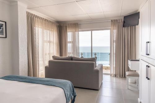 Postel nebo postele na pokoji v ubytování Diaz Ocean View Hotel