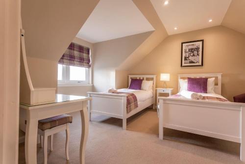 En eller flere senge i et værelse på Blacklaws Farmhouse - Blacklaws Steading