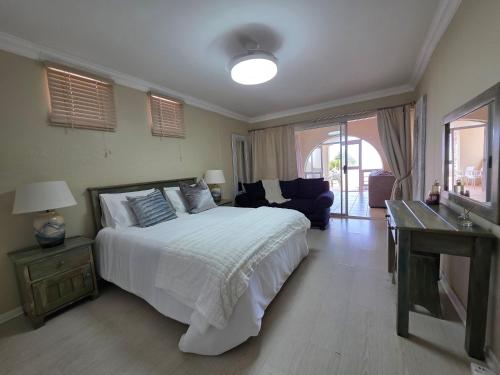 En eller flere senge i et værelse på Sea Soul