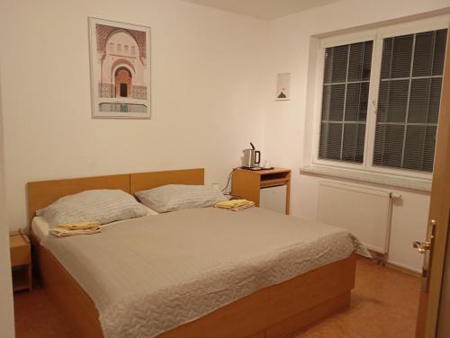 Postel nebo postele na pokoji v ubytování Vila Heda