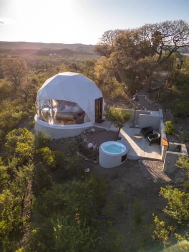 an overhead view of a tent in a field at Aguas Claras in Capilla del Monte