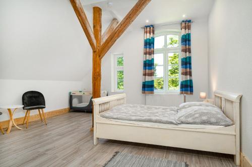 Postel nebo postele na pokoji v ubytování Alte Pastorei Wiefels