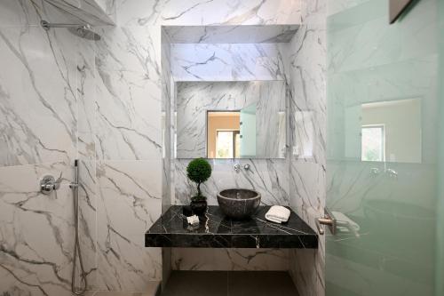 Et badeværelse på Mitos Ultimate Escape Villas