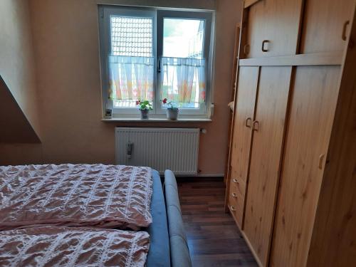 Postel nebo postele na pokoji v ubytování NEU! Ferienwohnung Unterfranken