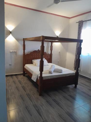 Ένα ή περισσότερα κρεβάτια σε δωμάτιο στο Chero-Palms