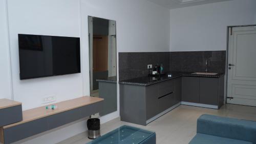 Η κουζίνα ή μικρή κουζίνα στο The Whispering Winds Resort