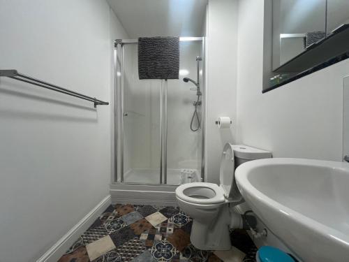 Ένα μπάνιο στο Ayr Cozy Corner Apartment