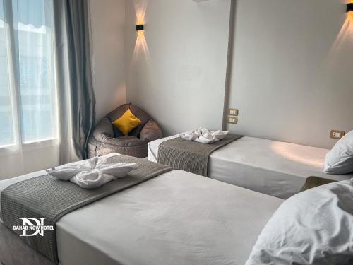 Een bed of bedden in een kamer bij Dahab Now