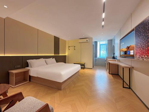 Postel nebo postele na pokoji v ubytování HuaHang Hotel - Free Shuttle&Free Breakfast - Guangzhou Baiyun International Airport