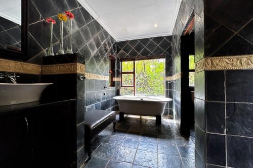 Ένα μπάνιο στο Elements Bush Villa 18