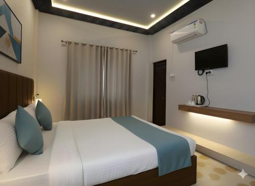 Voodi või voodid majutusasutuse Hotel Valencia Inn toas