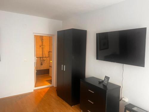 TV a/nebo společenská místnost v ubytování Hotel Ambienti