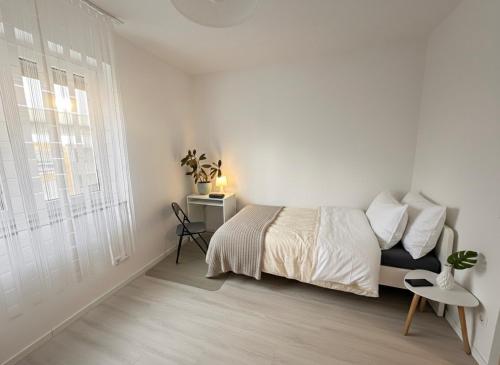 Postel nebo postele na pokoji v ubytování Sonnenblick Apartment