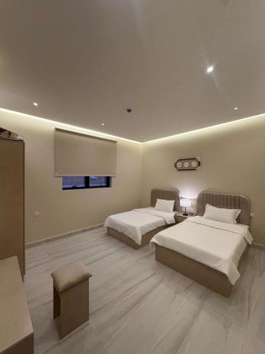 Ένα ή περισσότερα κρεβάτια σε δωμάτιο στο الواجهة