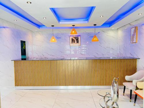 Телевизор и/или развлекательный центр в Nakawa Guest Lodge