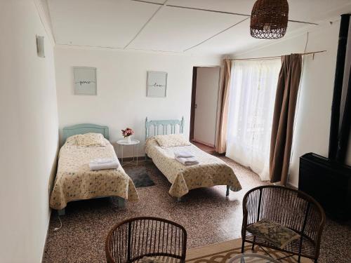 En eller flere senge i et værelse på Depto Güemes