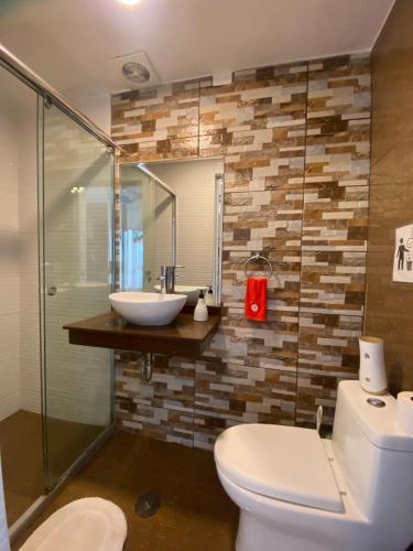 Koupelna v ubytování Lince Apartments