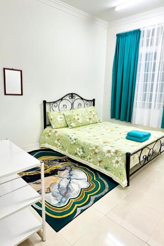 Ένα ή περισσότερα κρεβάτια σε δωμάτιο στο homestay berdekatan umt, unisza, airport ,sesma drawbridge dan stadium gong badak