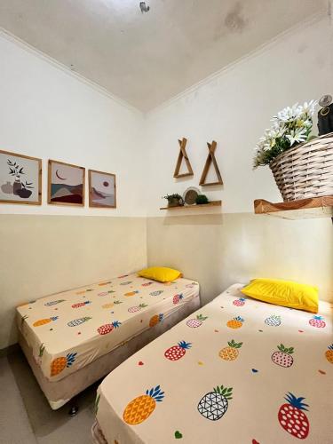 Кровать или кровати в номере Villa Seruni Bandungan