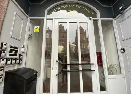 a front door of a building with a sign on it at Modern Studio, 1st floor, King Street Views in Nottingham
