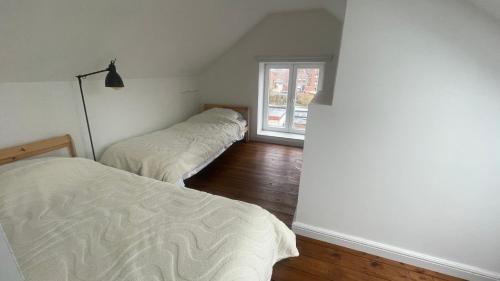 Postel nebo postele na pokoji v ubytování Maro Appartments