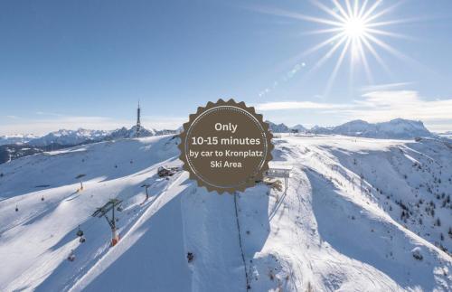 a sign on top of a snow covered mountain at Hotel Antholzerhof in Anterselva di Mezzo