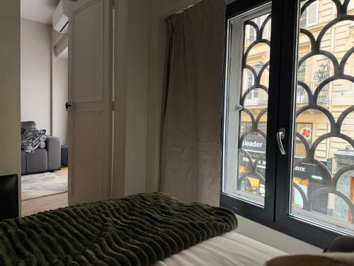 Charmant appartement avec chambre cosy et canapé convertible