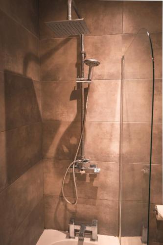 a shower in a bathroom with a sink at Hull Central Comfort in Hull