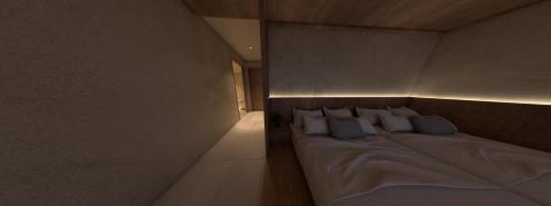 Кровать или кровати в номере 루미에르 디럭스 오션뷰 그랜드룸 01-광안리 해수욕장