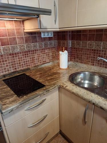 Η κουζίνα ή μικρή κουζίνα στο Apartamentos Scalera Cozy Inns