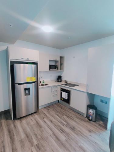 Kuchyň nebo kuchyňský kout v ubytování Chill Lodge