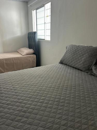 Ένα ή περισσότερα κρεβάτια σε δωμάτιο στο Casa Urbis